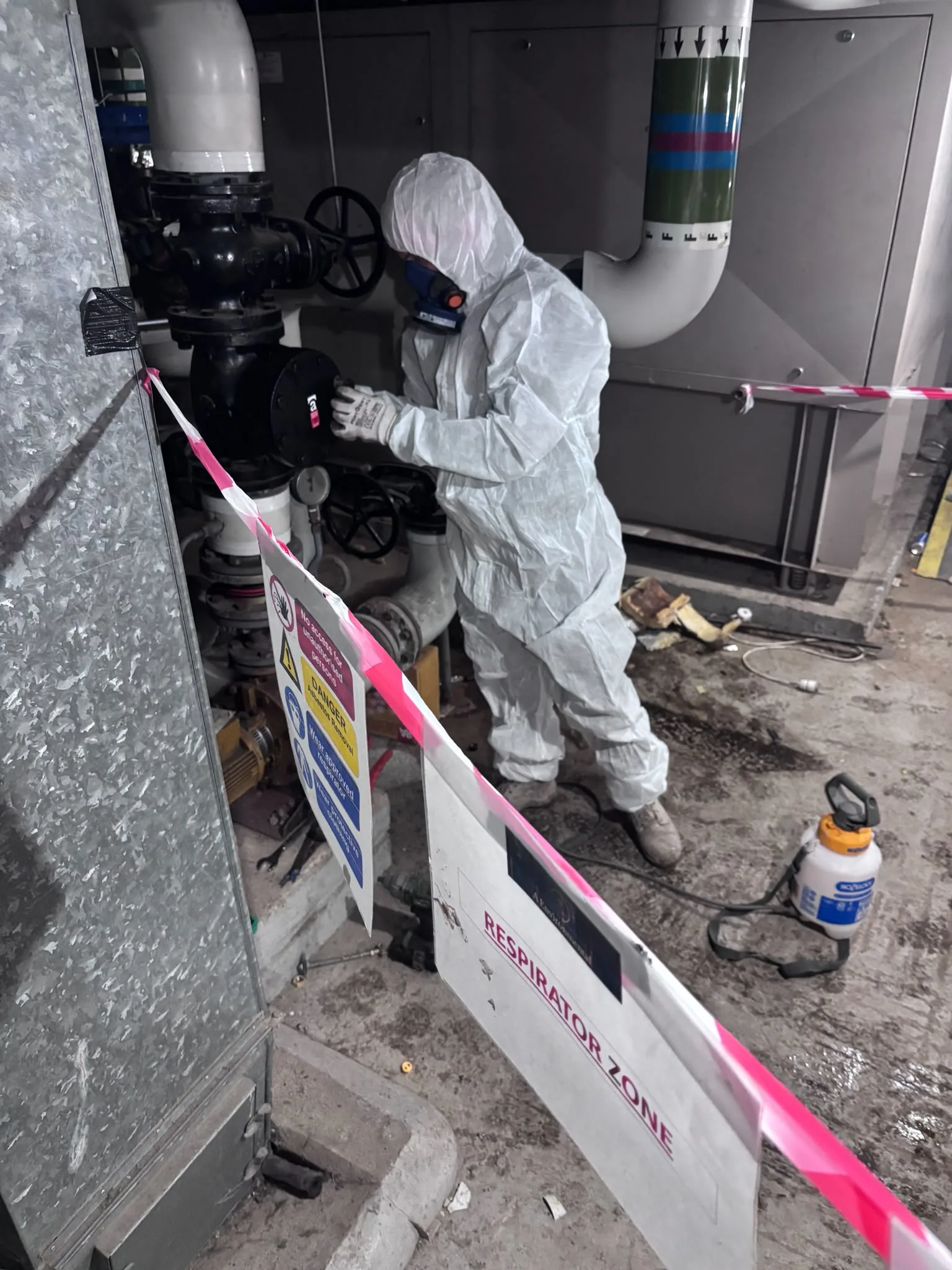 Asbestos artex removal from concrete soffit in St Paul's